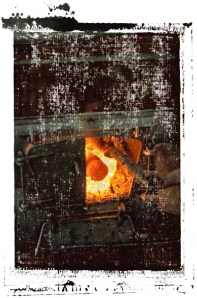 adding wood to boiler 0001